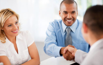 Successful group of businesspeople making a business deal. The two businessmen are shaking hands.  The focus is on the African-American man. 

[url=http://www.istockphoto.com/search/lightbox/9786622][img]http://img543.imageshack.us/img543/9562/business.jpg[/img][/url]

[url=http://www.istockphoto.com/search/lightbox/9786738][img]http://img830.imageshack.us/img830/1561/groupsk.jpg[/img][/url]